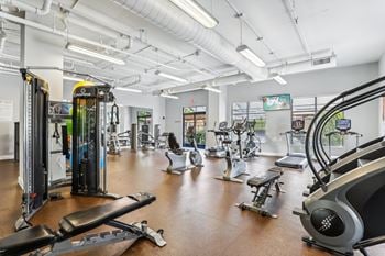 24-Hour fitness center with free weights and cardio machines